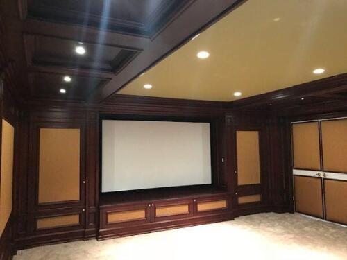 luxury custom built in cabinetry for home theater with contrasting paneling designed by Nino Madia