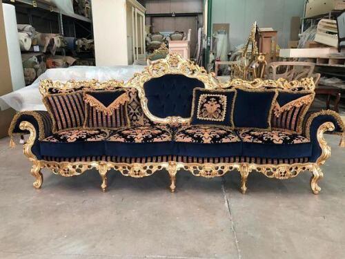 custom luxury french reproduction cabriolet sofa with navy blue and light orange upholstery and gilded carved wood trim by Nino Madia