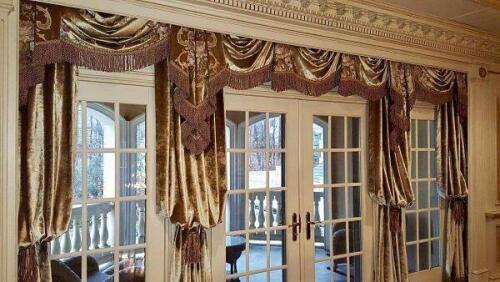 custom velvet drapery with Fringe and tassel holdbacks for french doors designed by Nino Madia