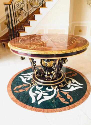 elegant round hall table with decorative wood inlay and acanthus pedestal with decorative gilding from Nino Madia
