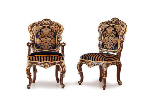 luxury traditional Italian dining chairs with and without arms. Carved wood with gilded accents and upholstered seat cushions from Nino Madia