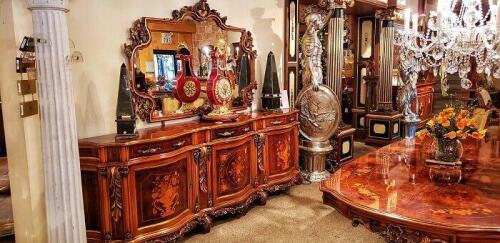 Ornate carved wood sideboard for dining room in the baroque french reproduction style. Floor samples for sale.